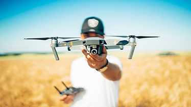 .Man holding a dron photo